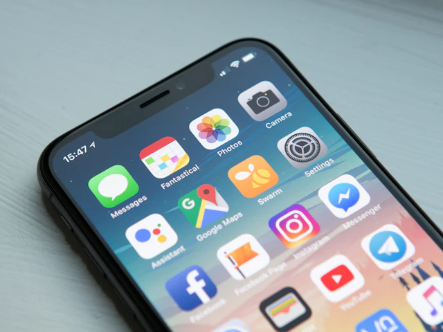 A smartphone with app icons on its home screen